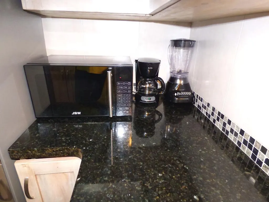 אוצ'ו ריוס Beach One Bedroom Suite A29 דירה